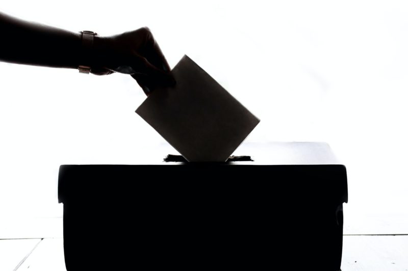 Silhouette of a vote being cast