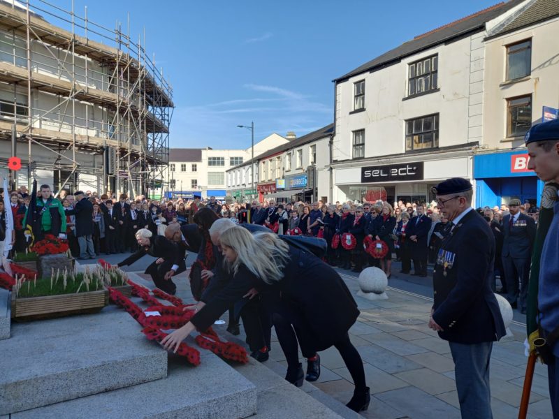Elected representatives laying wreaths at the cenotaph 