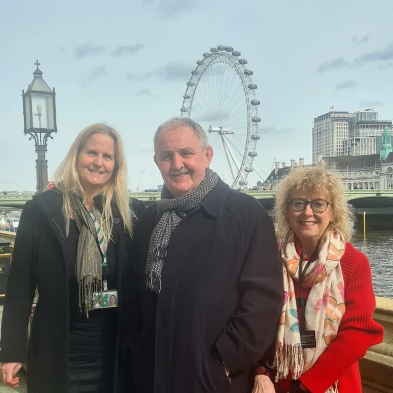 Mike Thomas MBE and his wife with Beth in Parliament